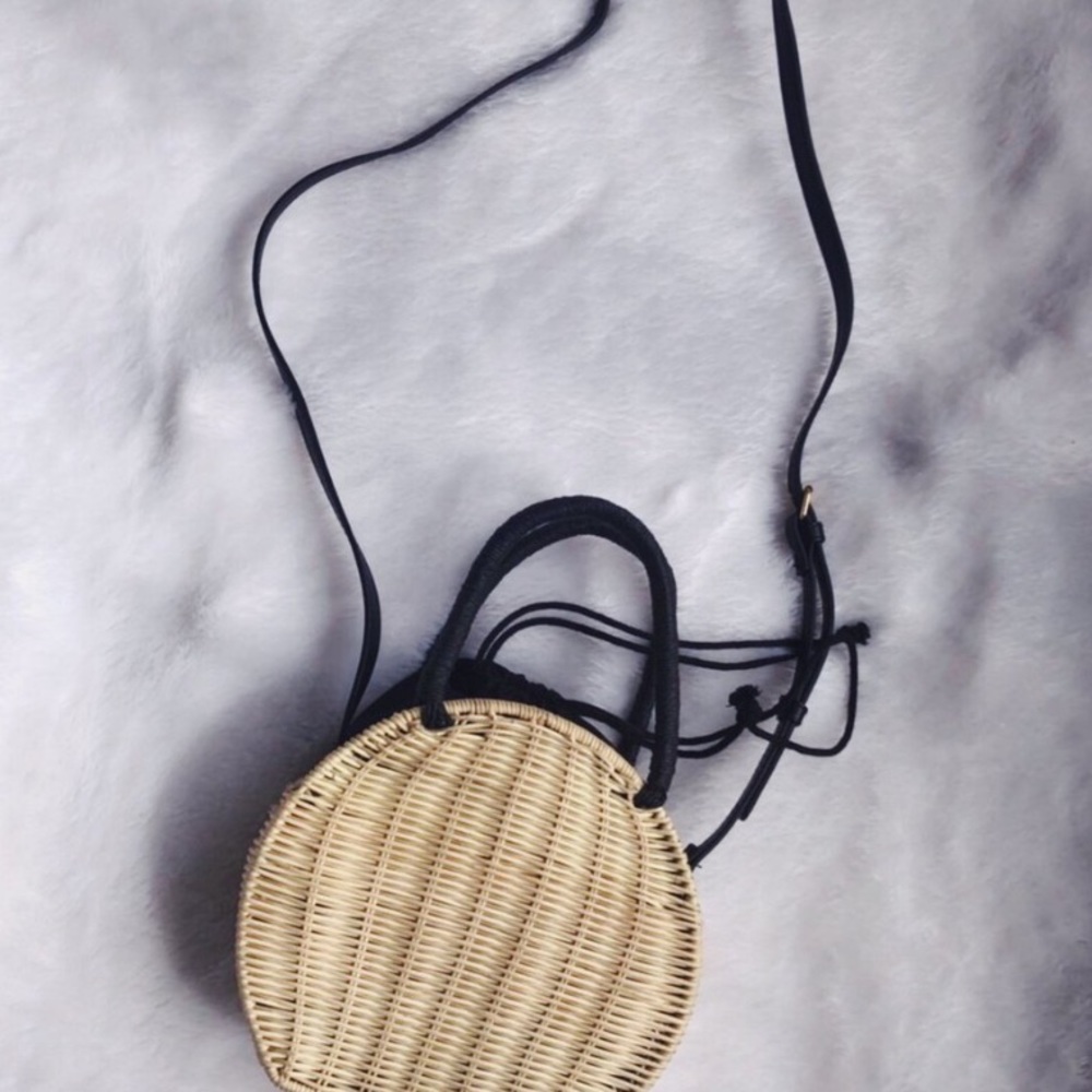 Straw bag with long black strap